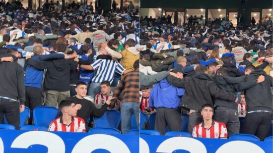 La imagen viral del derbi vasco: athleticzales aguantando el chaparrón en la grada de Anoeta